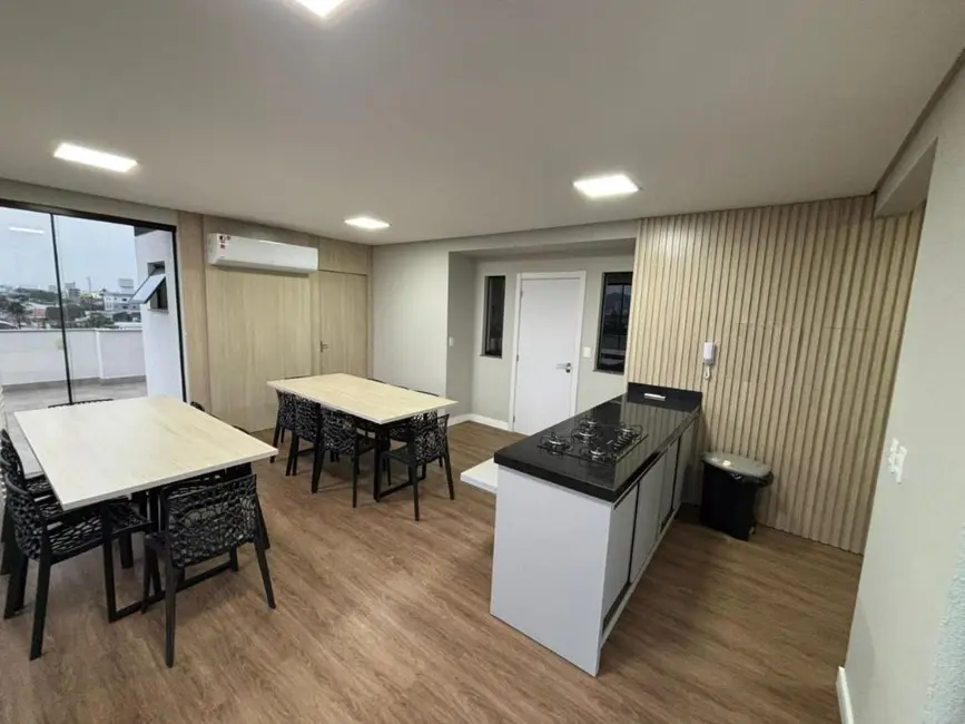 Foto 2 de Apartamento com 2 quartos à venda, 54m2 em Centro, Navegantes - SC