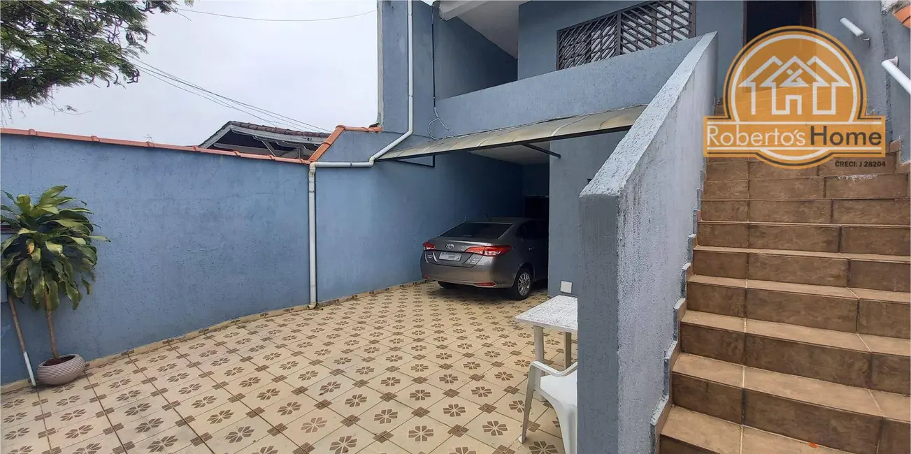 Foto 1 de Sobrado com 5 quartos à venda, 210m2 em Boqueirão, Praia Grande - SP