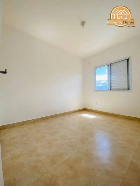 Foto 2 de Sobrado com 2 quartos à venda, 57m2 em Maracanã, Praia Grande - SP