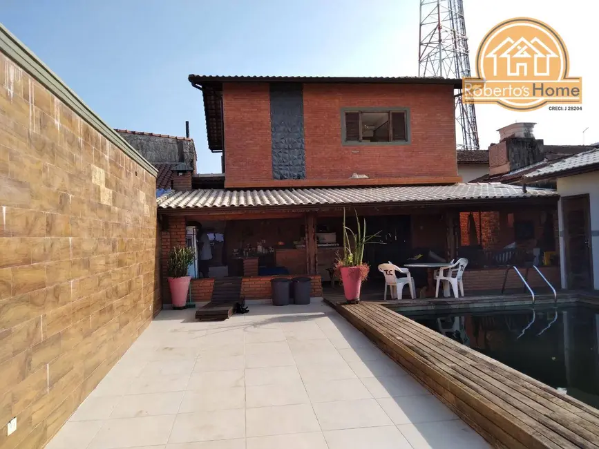 Foto 1 de Sobrado com 4 quartos à venda, 330m2 em Solemar, Praia Grande - SP