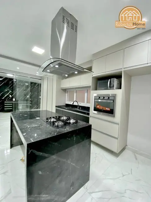 Foto 1 de Sobrado com 3 quartos à venda, 117m2 em Praia Grande - SP