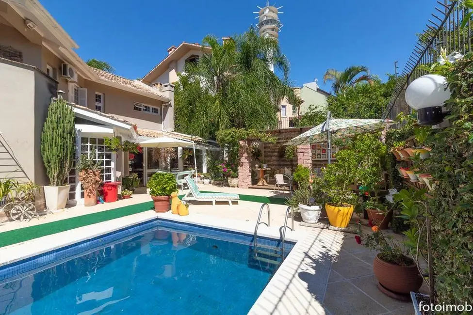 Casa com 4 quartos à venda, 442m2 em Santa Tereza, Porto Alegre - RS - imagem 4 Foto 4 de Casa com 4 quartos à venda, 442m2 em Santa Tereza, Porto Alegre - RS