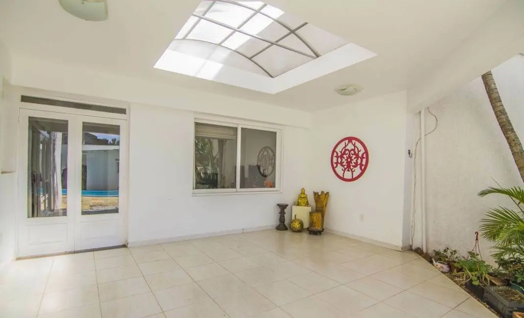 Foto 6 de Casa com 4 quartos à venda, 250m2 em Menino Deus, Porto Alegre - RS