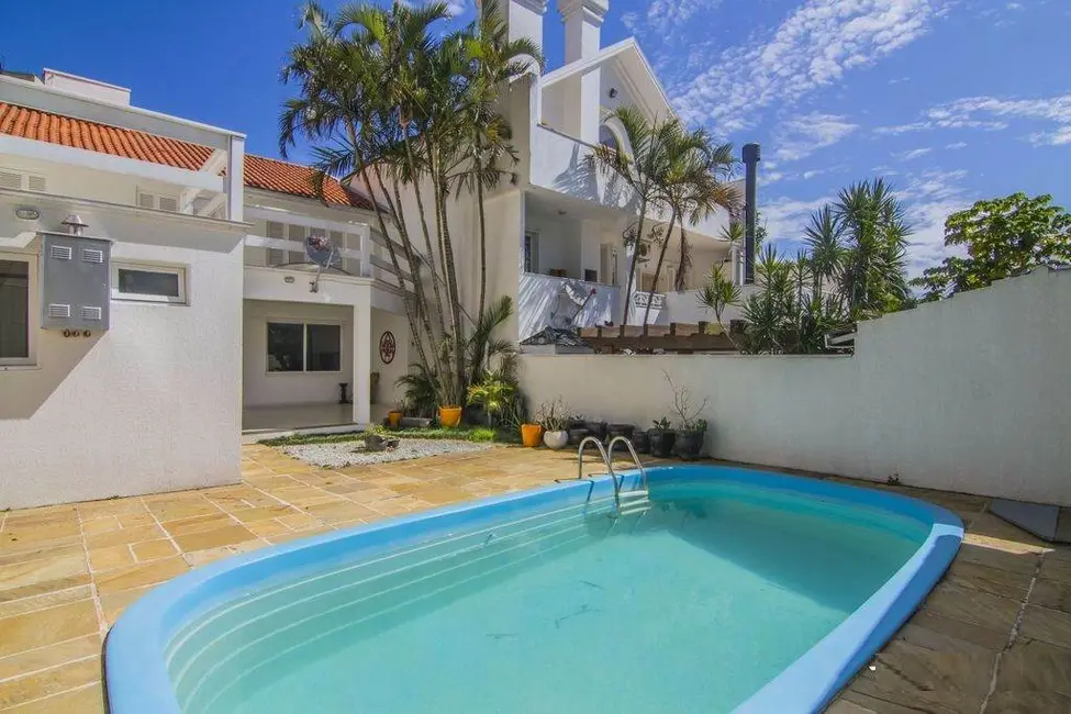 Foto 1 de Casa com 4 quartos à venda, 250m2 em Menino Deus, Porto Alegre - RS