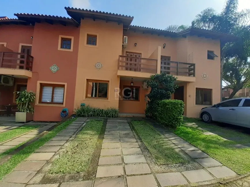 Foto 1 de Casa de Condomínio com 3 quartos à venda, 144m2 em Cavalhada, Porto Alegre - RS