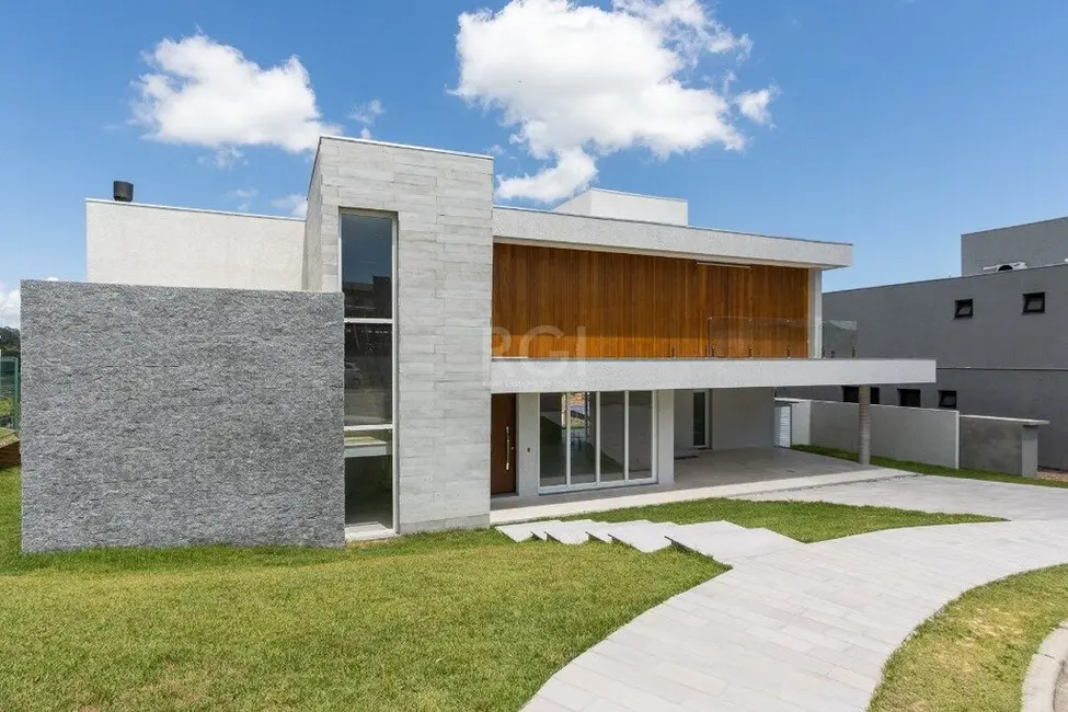 Foto 3 de Casa de Condomínio com 4 quartos à venda, 420m2 em Vila Nova, Porto Alegre - RS