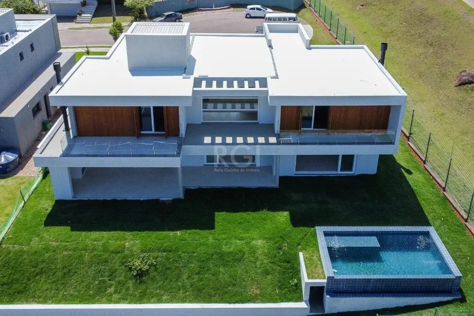 Foto 1 de Casa de Condomínio com 4 quartos à venda, 420m2 em Vila Nova, Porto Alegre - RS