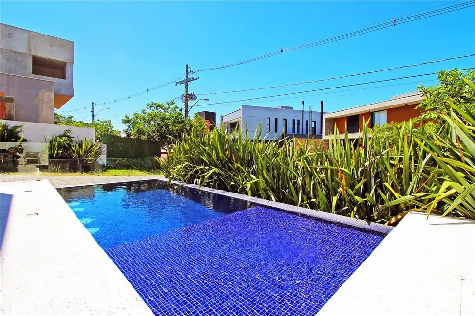 Foto 4 de Casa com 4 quartos à venda, 341m2 em Vila Nova, Porto Alegre - RS