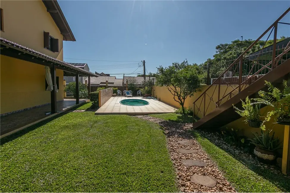 Casa com 4 quartos à venda, 509m2 em Parque Santa Fé, Porto Alegre - RS - imagem 6 Foto 6 de Casa com 4 quartos à venda, 509m2 em Parque Santa Fé, Porto Alegre - RS
