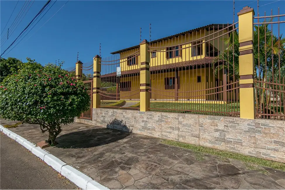 Foto 2 de Casa com 4 quartos à venda, 509m2 em Parque Santa Fé, Porto Alegre - RS