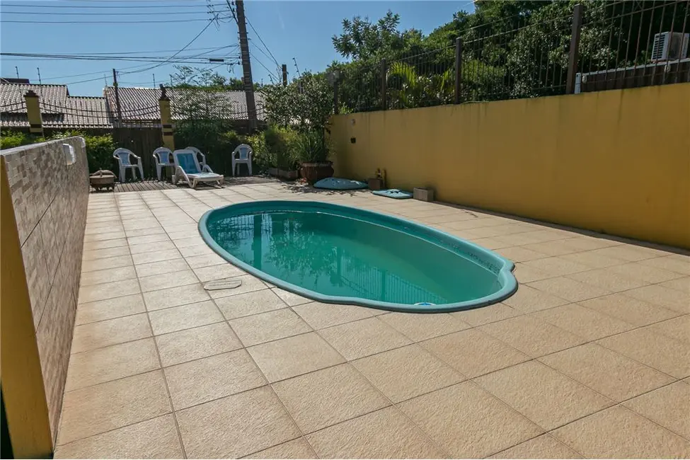 Casa com 4 quartos à venda, 509m2 em Parque Santa Fé, Porto Alegre - RS - imagem 7 Foto 7 de Casa com 4 quartos à venda, 509m2 em Parque Santa Fé, Porto Alegre - RS