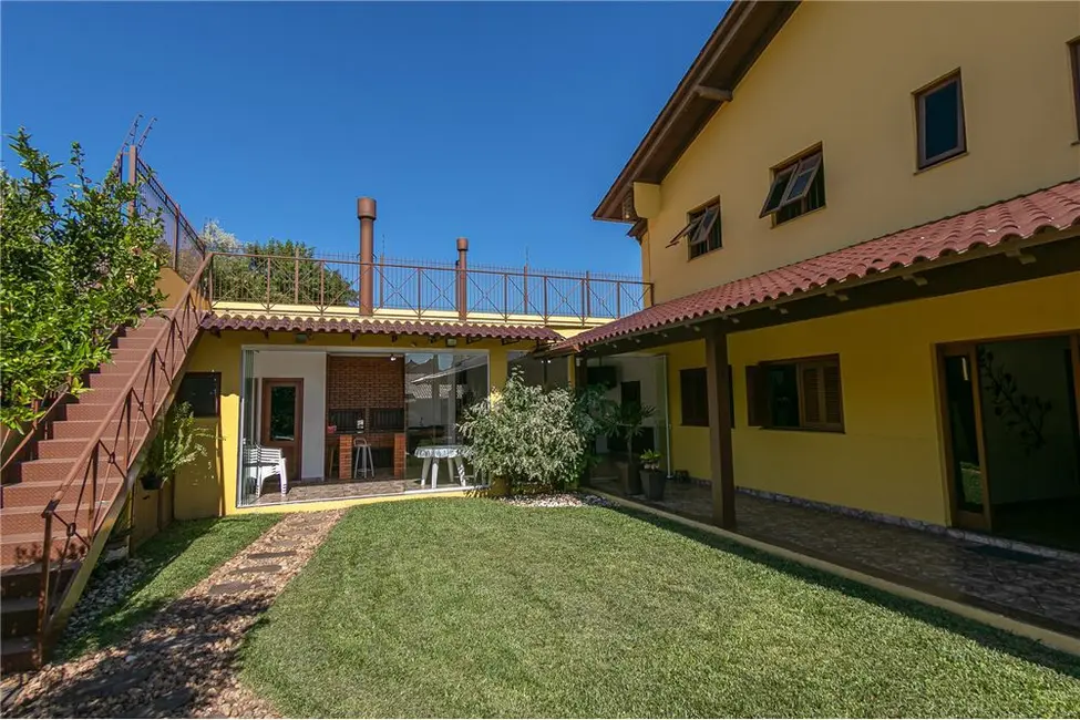 Casa com 4 quartos à venda, 509m2 em Parque Santa Fé, Porto Alegre - RS - imagem 8 Foto 8 de Casa com 4 quartos à venda, 509m2 em Parque Santa Fé, Porto Alegre - RS