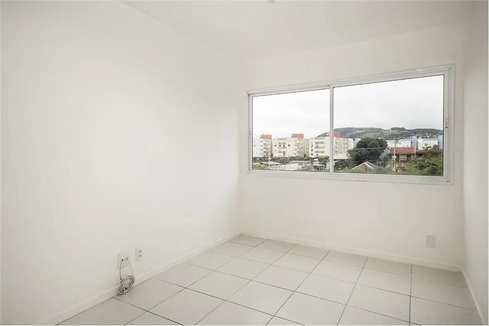 Foto 2 de Apartamento com 2 quartos à venda, 51m2 em Partenon, Porto Alegre - RS