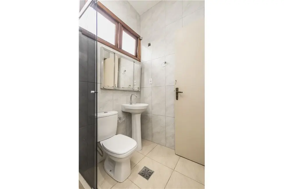 Foto 8 de Casa com 5 quartos à venda, 200m2 em Rio Branco, Porto Alegre - RS