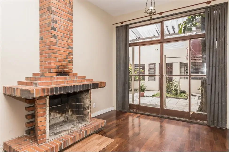 Foto 3 de Casa com 5 quartos à venda, 200m2 em Rio Branco, Porto Alegre - RS