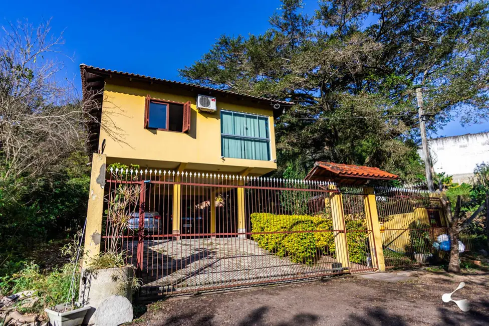 Foto 2 de Casa com 5 quartos à venda, 350m2 em Jardim Sabará, Porto Alegre - RS