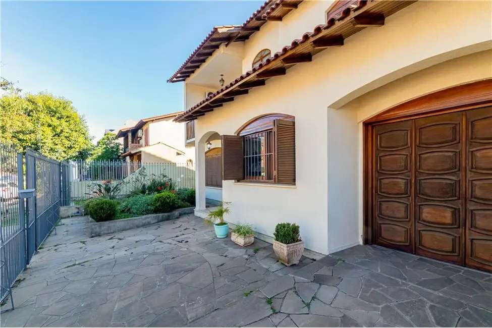 Foto 5 de Casa com 4 quartos à venda, 294m2 em Jardim Itu, Porto Alegre - RS