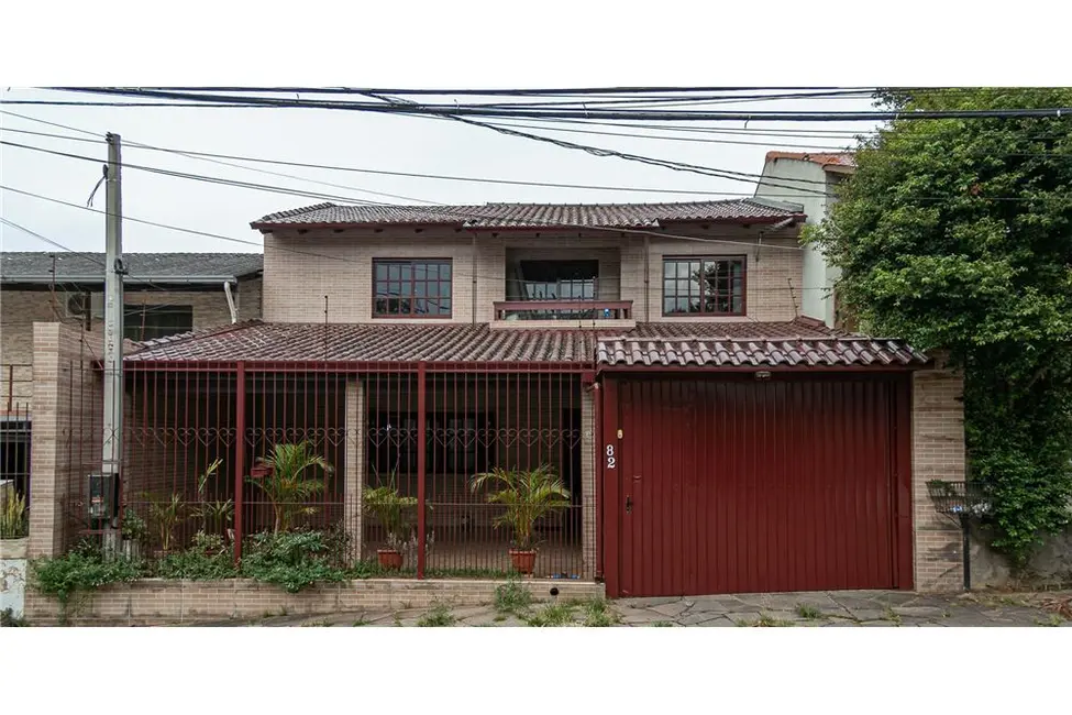 Foto 1 de Casa com 4 quartos à venda, 279m2 em Jardim Sabará, Porto Alegre - RS