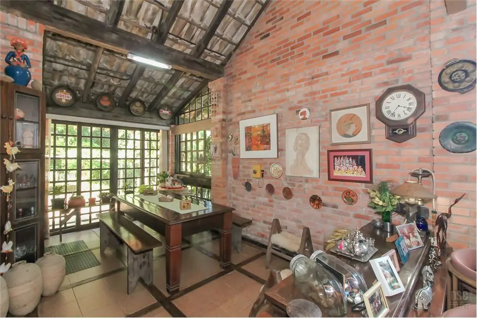 Foto 9 de Casa com 4 quartos à venda, 200m2 em Vila Nova, Porto Alegre - RS