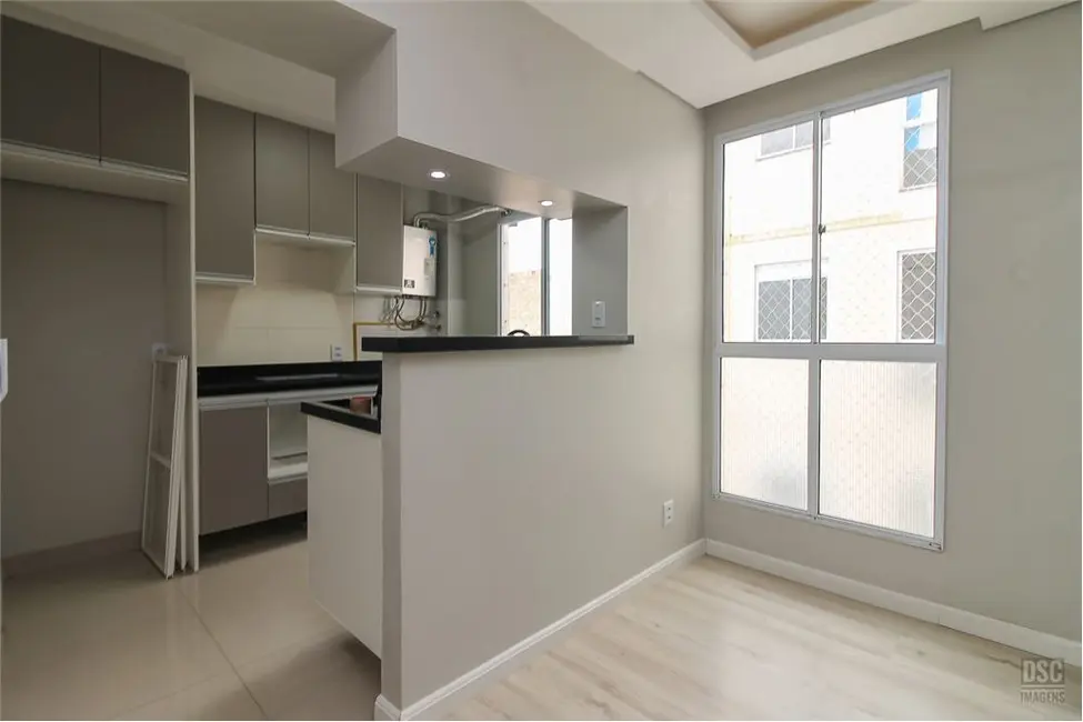 Foto 2 de Apartamento com 2 quartos à venda, 40m2 em Vila Nova, Porto Alegre - RS