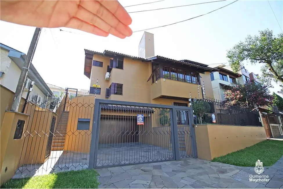Foto 1 de Casa com 5 quartos à venda, 275m2 em Glória, Porto Alegre - RS