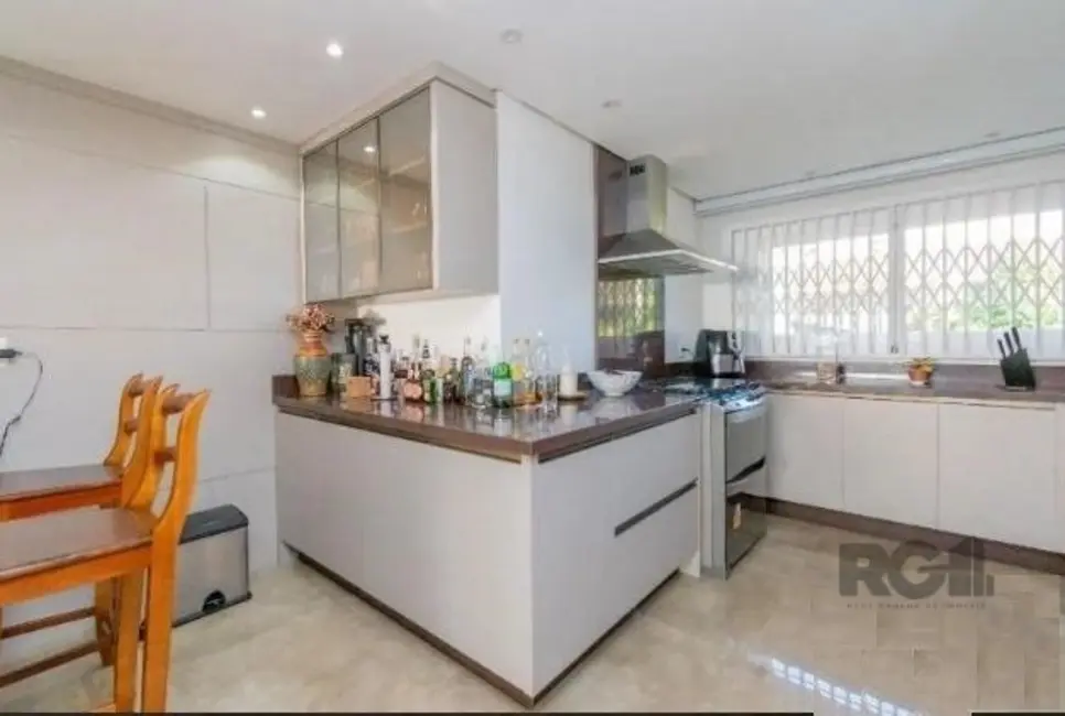 Foto 8 de Casa de Condomínio com 4 quartos à venda, 340m2 em Vila Assunção, Porto Alegre - RS