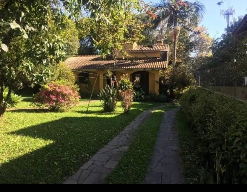 Foto 1 de Casa com 2 quartos à venda, 164m2 em Cavalhada, Porto Alegre - RS