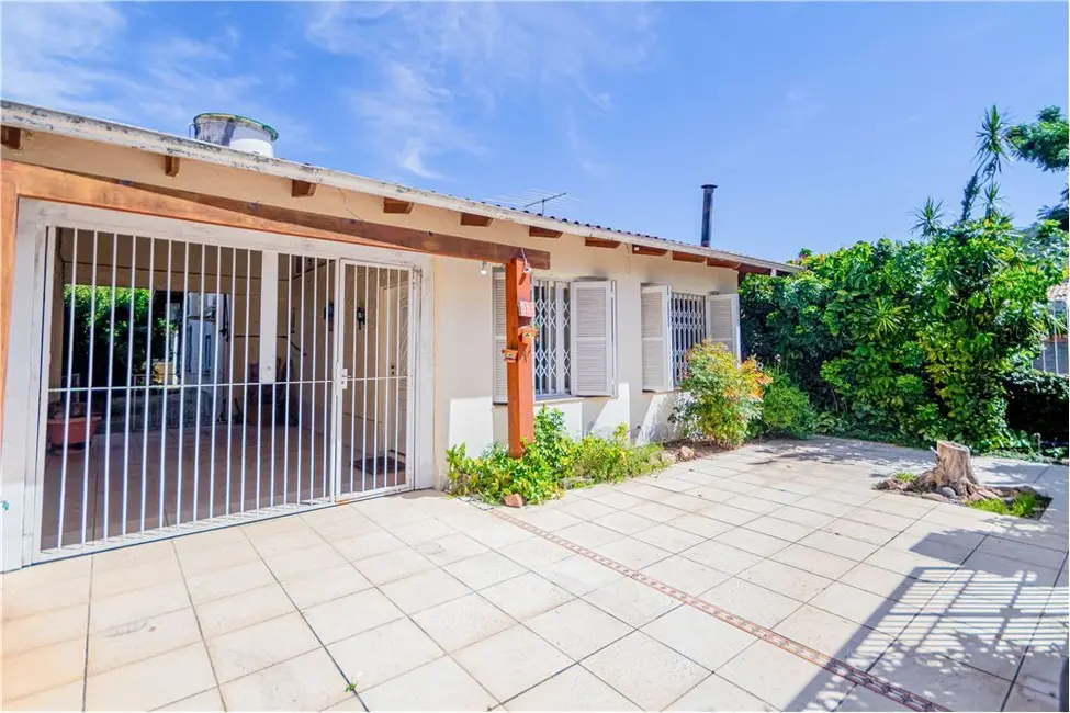 Foto 2 de Casa com 5 quartos à venda, 239m2 em Hípica, Porto Alegre - RS