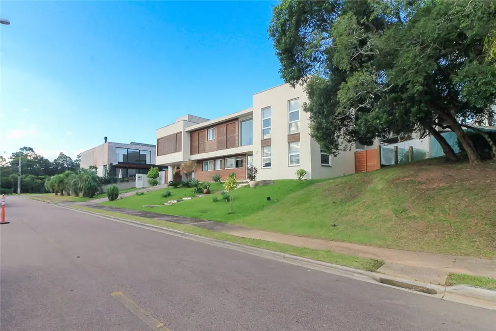 Casa de Condomínio com 4 quartos à venda, 309m2 em Vila Nova, Porto Alegre - RS - imagem 3 Foto 3 de Casa de Condomínio com 4 quartos à venda, 309m2 em Vila Nova, Porto Alegre - RS