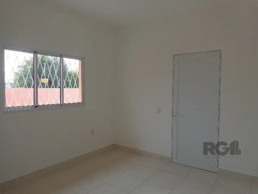 Foto 2 de Casa com 2 quartos à venda, 80m2 em Vila Ipiranga, Porto Alegre - RS