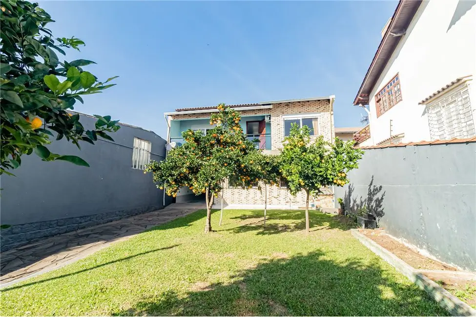 Foto 2 de Casa com 2 quartos à venda, 230m2 em Jardim Itu, Porto Alegre - RS