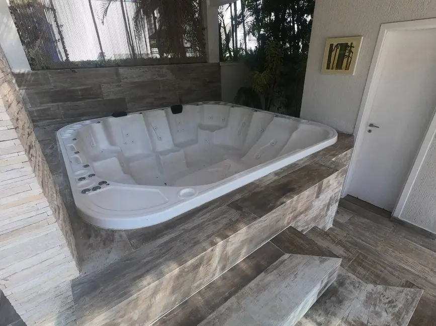 Foto 9 de Casa com 5 quartos à venda, 525m2 em Riviera de São Lourenço, Bertioga - SP