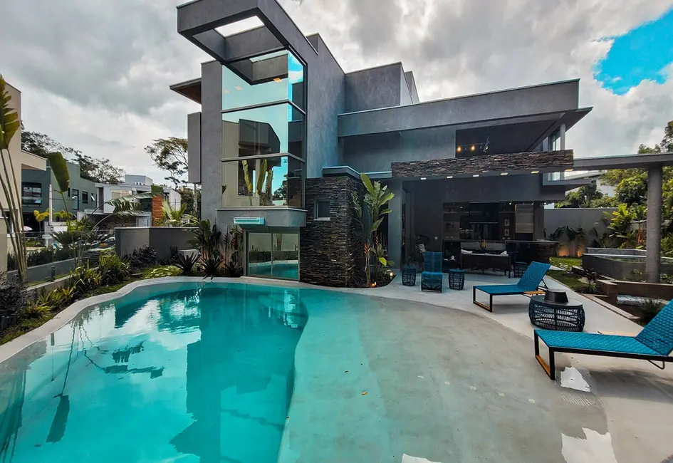 Foto 1 de Casa com 5 quartos à venda, 448m2 em Riviera de São Lourenço, Bertioga - SP