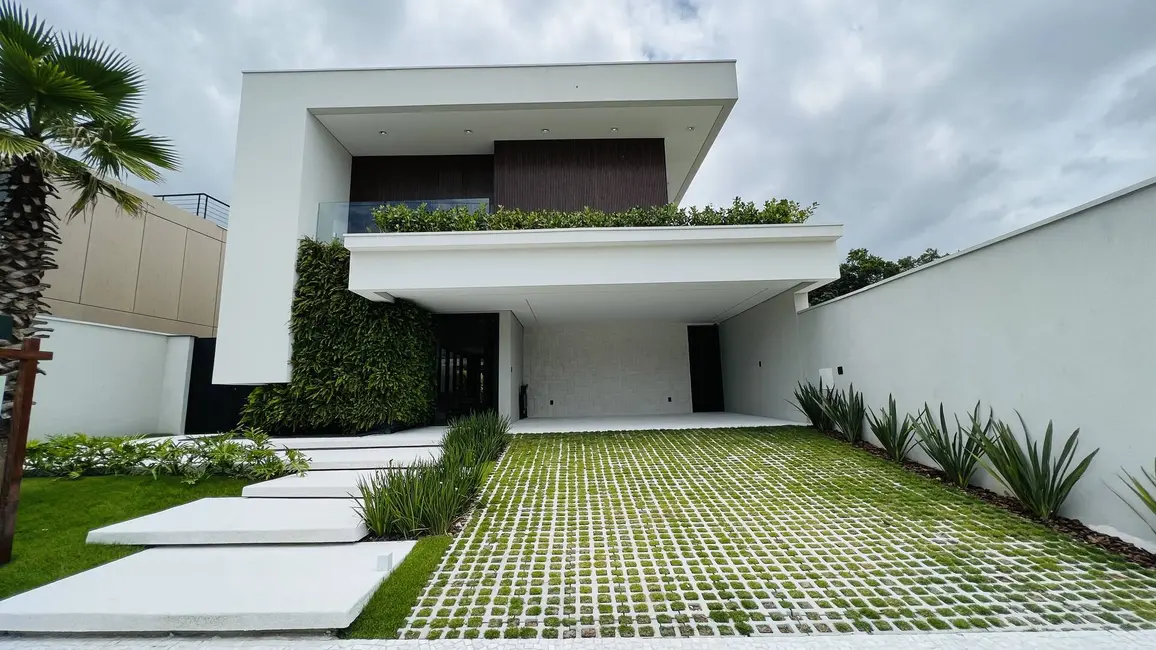 Foto 1 de Casa com 5 quartos à venda, 416m2 em Riviera de São Lourenço, Bertioga - SP