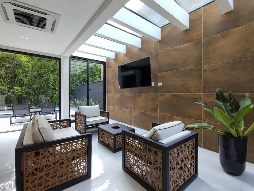 Foto 9 de Casa com 5 quartos à venda, 335m2 em Riviera de São Lourenço, Bertioga - SP