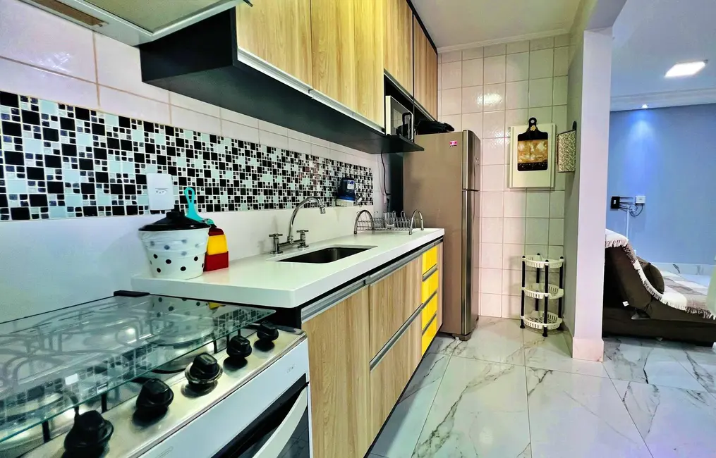 Foto 6 de Apartamento com 2 quartos à venda, 61m2 em Riviera de São Lourenço, Bertioga - SP