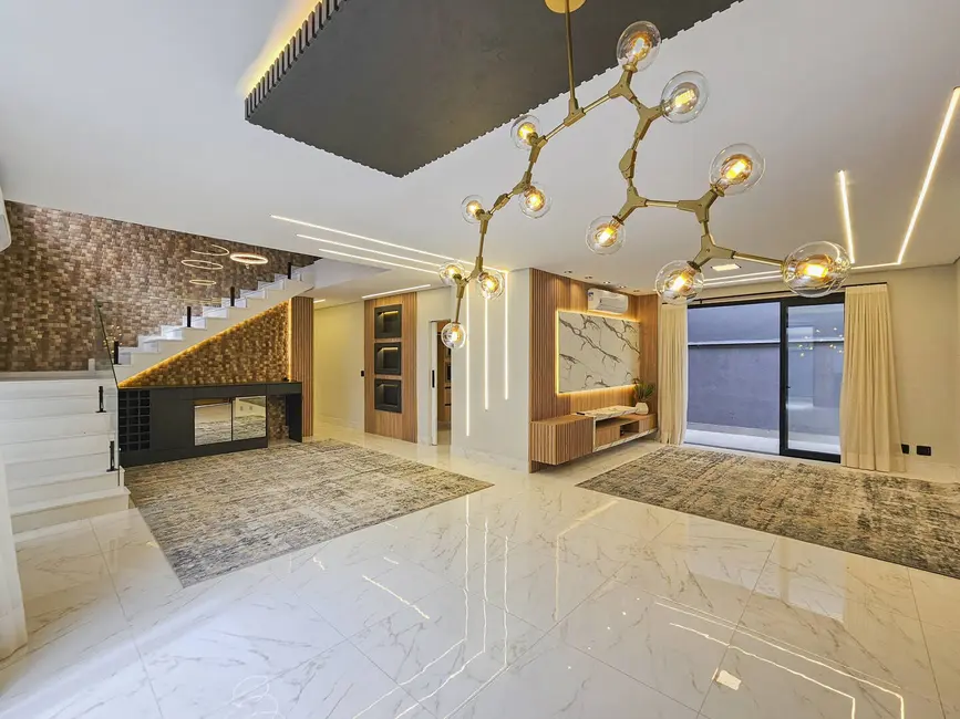 Foto 2 de Casa com 5 quartos à venda, 273m2 em Riviera de São Lourenço, Bertioga - SP
