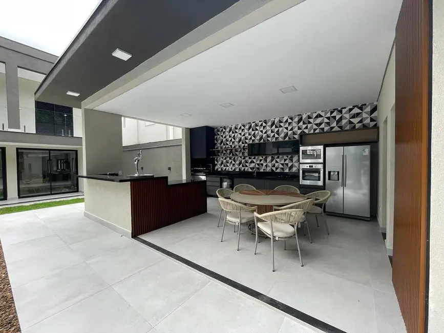 Foto 2 de Casa com 5 quartos à venda, 379m2 em Riviera de São Lourenço, Bertioga - SP