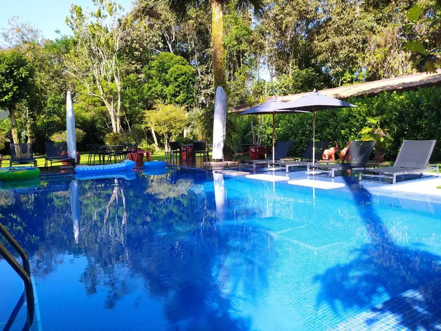 Foto 1 de Casa com 4 quartos à venda, 565m2 em Riviera de São Lourenço, Bertioga - SP