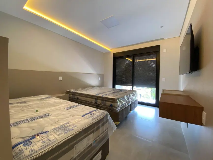 Foto 9 de Casa com 6 quartos à venda, 450m2 em Riviera de São Lourenço, Bertioga - SP