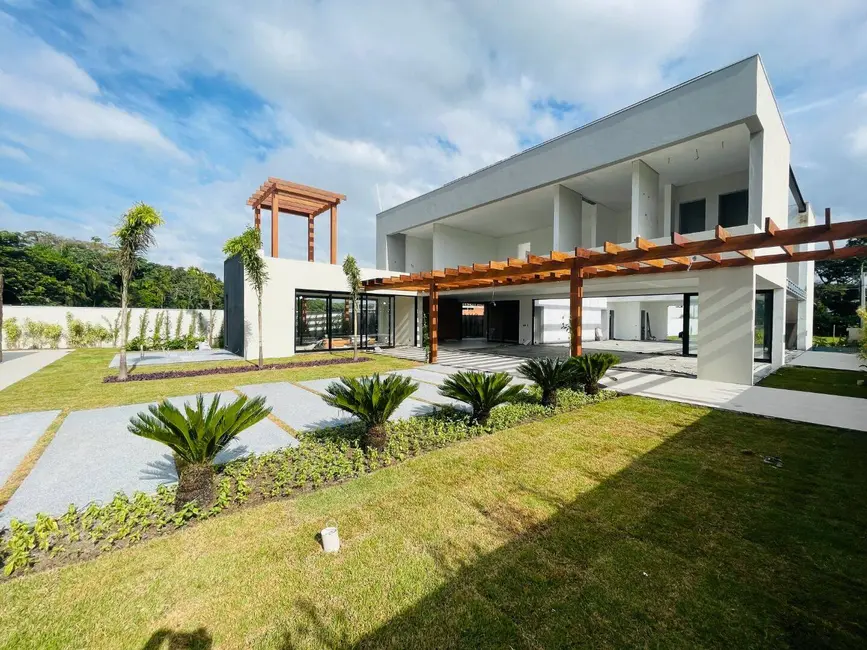 Foto 1 de Casa com 5 quartos à venda, 940m2 em Riviera de São Lourenço, Bertioga - SP