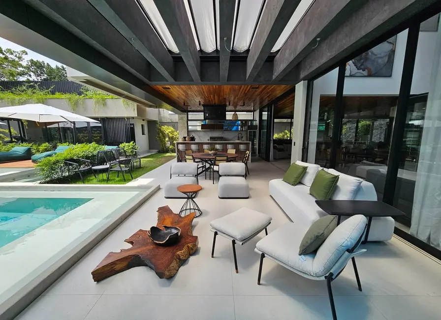 Foto 2 de Casa com 7 quartos à venda, 940m2 em Riviera de São Lourenço, Bertioga - SP