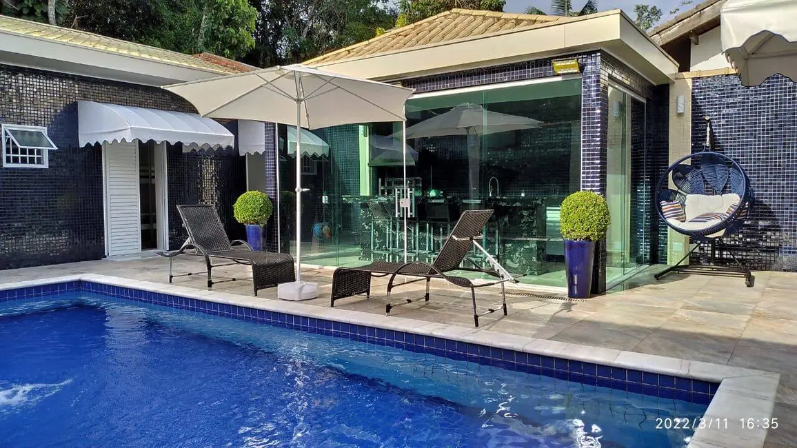 Casa com 5 quartos à venda, 200m2 em Riviera de São Lourenço, Bertioga - SP - imagem 1 Foto 1 de Casa com 5 quartos à venda, 200m2 em Riviera de São Lourenço, Bertioga - SP