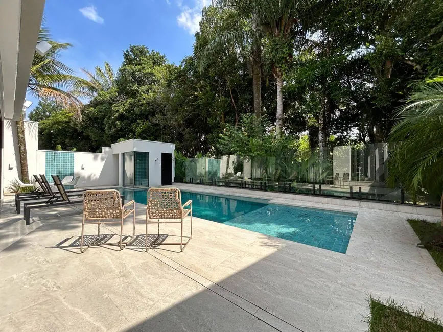 Casa com 6 quartos à venda, 400m2 em Riviera de São Lourenço, Bertioga - SP - imagem 1 Foto 1 de Casa com 6 quartos à venda, 400m2 em Riviera de São Lourenço, Bertioga - SP