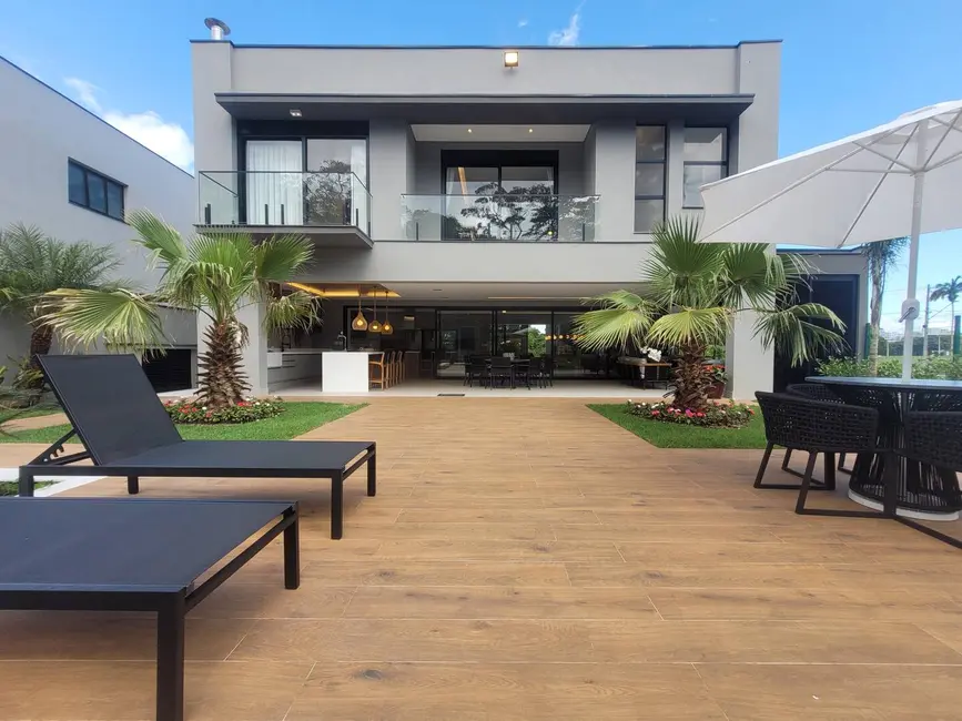 Foto 6 de Casa com 7 quartos à venda, 620m2 em Riviera de São Lourenço, Bertioga - SP