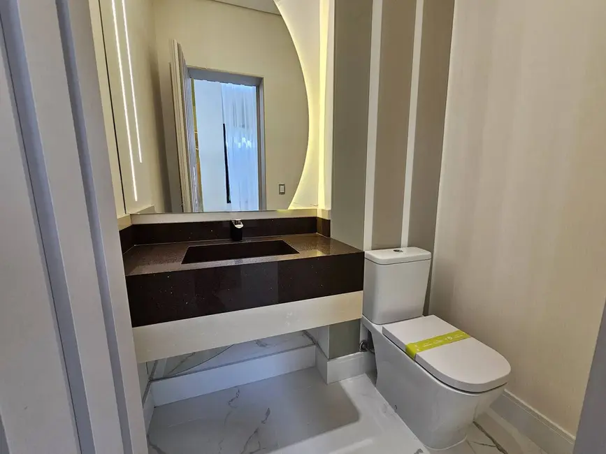 Foto 8 de Casa com 5 quartos à venda, 380m2 em Riviera de São Lourenço, Bertioga - SP