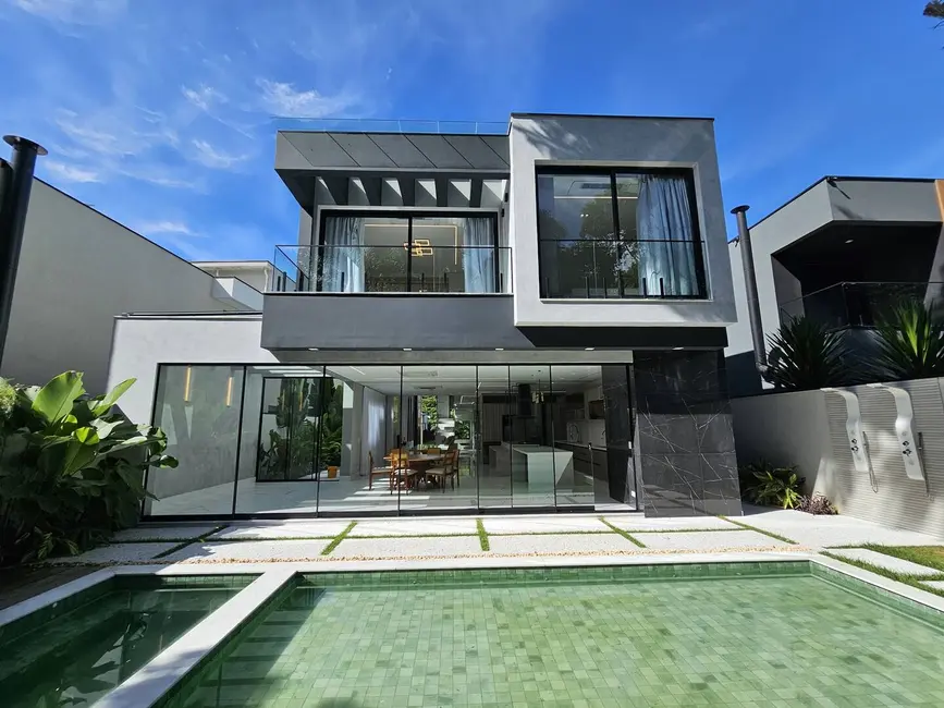 Foto 2 de Casa com 5 quartos à venda, 380m2 em Riviera de São Lourenço, Bertioga - SP