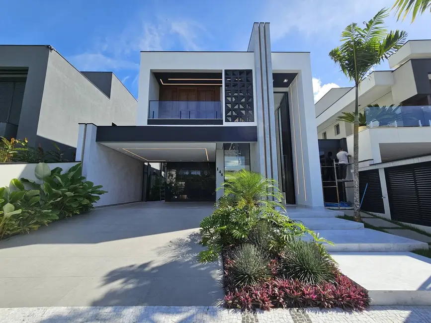 Foto 1 de Casa com 5 quartos à venda, 380m2 em Riviera de São Lourenço, Bertioga - SP