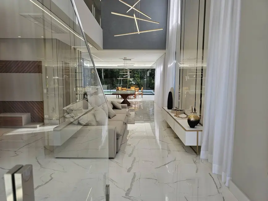 Foto 6 de Casa com 5 quartos à venda, 380m2 em Riviera de São Lourenço, Bertioga - SP