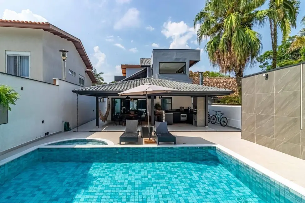Foto 1 de Casa com 4 quartos à venda, 305m2 em Riviera de São Lourenço, Bertioga - SP
